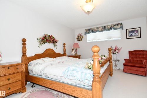 5 102 Bridgeport Crossing, Leduc, AB - Indoor Photo Showing Bedroom