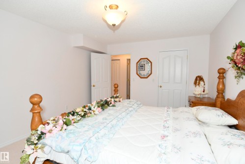 5 102 Bridgeport Crossing, Leduc, AB - Indoor Photo Showing Bedroom