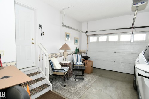5 102 Bridgeport Crossing, Leduc, AB - Indoor Photo Showing Garage