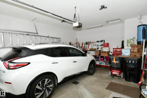 5 102 Bridgeport Crossing, Leduc, AB - Indoor Photo Showing Garage