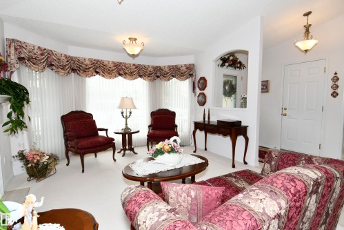 5 102 Bridgeport Crossing, Leduc, AB - Indoor Photo Showing Living Room