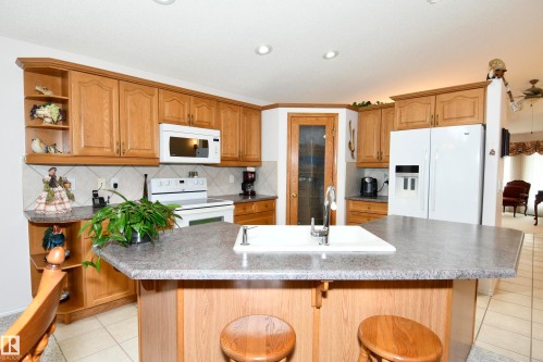 5 102 Bridgeport Crossing, Leduc, AB - Indoor Photo Showing Kitchen With Double Sink