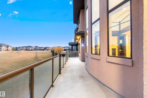 Hall with a residential view - 4811 Woolsey Lane, Edmonton, AB - Outdoor With Balcony With Exterior