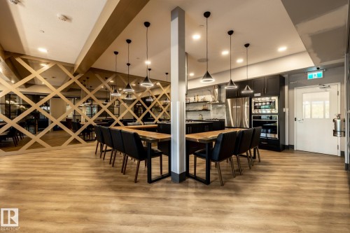 Dining space featuring light wood-style floors and recessed lighting - 7471 May Common, Edmonton, AB - Indoor Photo Showing Dining Room
