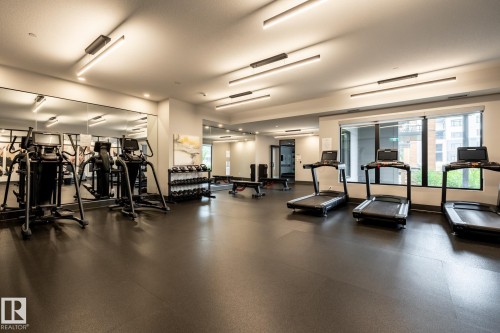 View of workout area - 7471 May Common, Edmonton, AB - Indoor Photo Showing Gym Room