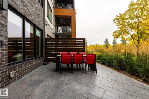 Patio / terrace with outdoor dining area and a patio area - 7471 May Common, Edmonton, AB - Outdoor