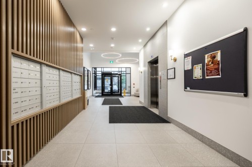 Community lobby with recessed lighting and a high ceiling - 7471 May Common, Edmonton, AB - Indoor Photo Showing Other Room