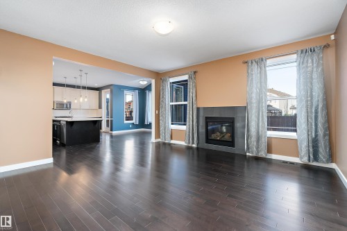 103 Rosemount Bay, Beaumont, AB - Indoor Photo Showing Living Room With Fireplace