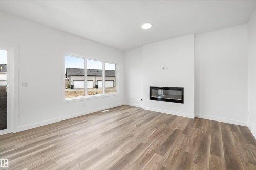 4039 207 Street, Edmonton, AB - Indoor Photo Showing Living Room With Fireplace