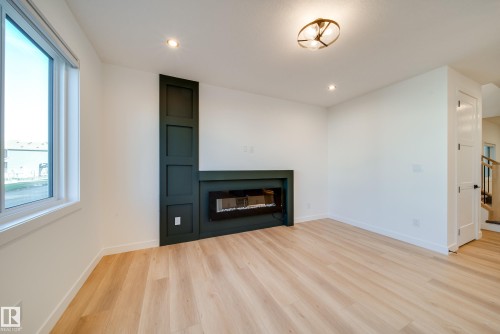 18 Blackbird Bend, Fort Saskatchewan, AB - Indoor Photo Showing Living Room With Fireplace