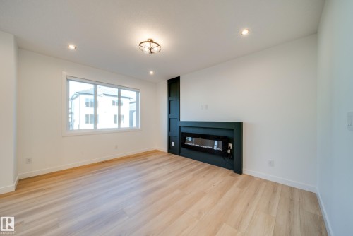 18 Blackbird Bend, Fort Saskatchewan, AB - Indoor Photo Showing Living Room With Fireplace