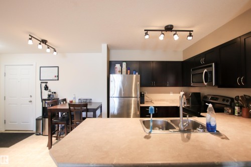 125 920 156 Street, Edmonton, AB - Indoor Photo Showing Kitchen With Double Sink
