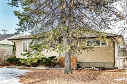 View of side of home with stucco siding - 