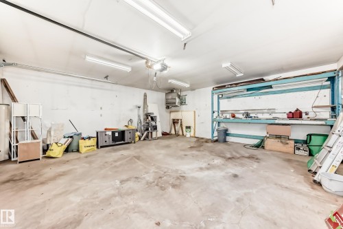 Garage featuring a heating unit - 8639 64 Avenue Nw, Edmonton, AB - Indoor Photo Showing Garage