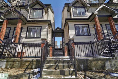 View of front of house with stairs - 23 4821 Terwillegar Common, Edmonton, AB - Outdoor With Facade