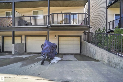 Garage with driveway - 23 4821 Terwillegar Common, Edmonton, AB - Outdoor With Balcony