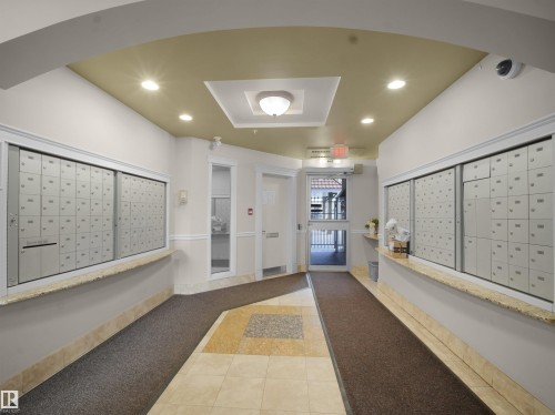 Community lobby with recessed lighting and a raised ceiling - 308 10333 112 Street Street, Edmonton, AB - Indoor Photo Showing Other Room