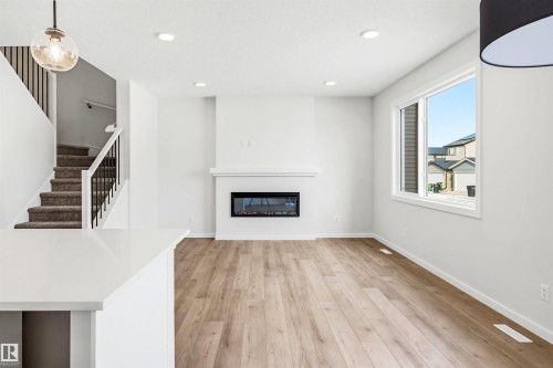 17351 3 Street, Edmonton, AB - Indoor Photo Showing Living Room With Fireplace