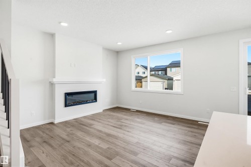 17351 3 Street, Edmonton, AB - Indoor Photo Showing Living Room With Fireplace