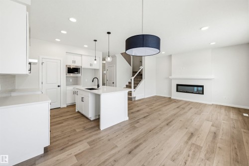 17351 3 Street, Edmonton, AB - Indoor Photo Showing Other Room With Fireplace