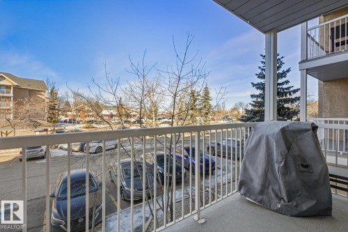 Balcony with area for grilling and a residential view - 237 17447 98A Avenue, Edmonton, AB - Outdoor With Balcony With Exterior