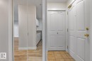Hall featuring light tile patterned flooring - 237 17447 98A Avenue, Edmonton, AB  - Indoor Photo Showing Other Room 