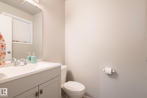 Bathroom with vanity and a shower with shower curtain - 3530 42 Street, Edmonton, AB - Indoor Photo Showing Bathroom