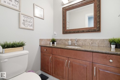 Bathroom featuring vanity and toilet - 48 Douglas Crescent, Leduc, AB - Indoor Photo Showing Bathroom