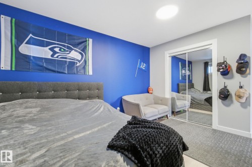 Bedroom featuring baseboards and a closet - 48 Douglas Crescent, Leduc, AB - Indoor Photo Showing Bedroom