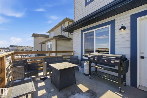 View of patio with outdoor furniture - 48 Douglas Crescent, Leduc, AB - Outdoor With Deck Patio Veranda With Exterior