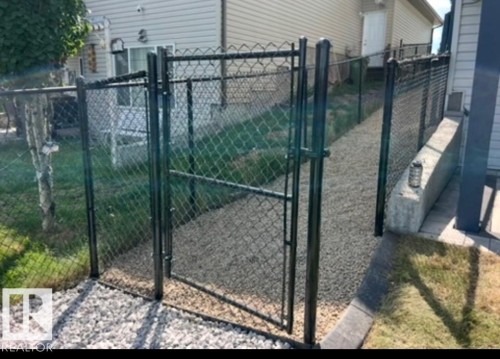 View of gate - 48 Douglas Crescent, Leduc, AB - Outdoor