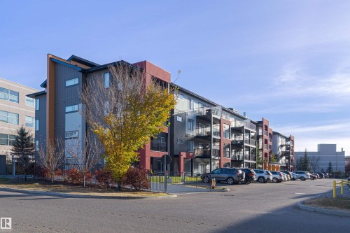 View of apartment building / complex with uncovered parking - 211 340 Windermere Road, Edmonton, AB - Outdoor With Facade