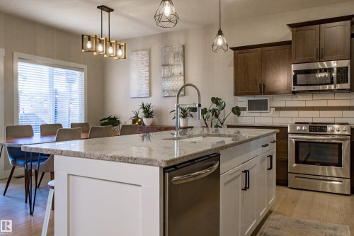 28 Hilldowns Drive, Spruce Grove, AB - Indoor Photo Showing Kitchen With Double Sink With Upgraded Kitchen