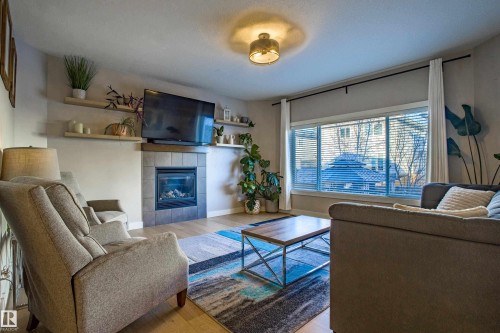 28 Hilldowns Drive, Spruce Grove, AB - Indoor Photo Showing Living Room With Fireplace