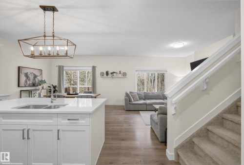 100 Meadowlink Common, Spruce Grove, AB - Indoor Photo Showing Kitchen With Double Sink