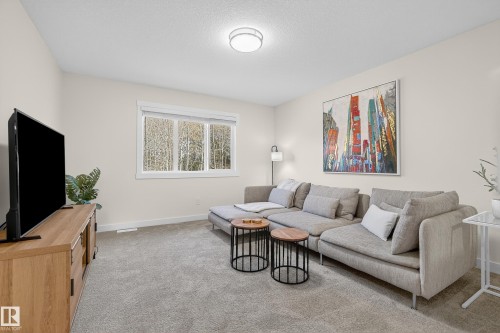 100 Meadowlink Common, Spruce Grove, AB - Indoor Photo Showing Living Room