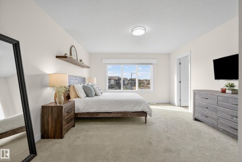 100 Meadowlink Common, Spruce Grove, AB - Indoor Photo Showing Bedroom