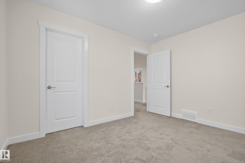 100 Meadowlink Common, Spruce Grove, AB - Indoor Photo Showing Other Room