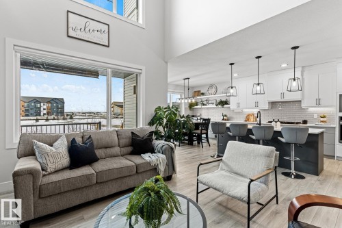 Open kitchen, dining and living room with 18' ceiling open to below and 9' ceilings through out the rest of the main floor. - 5 Starling, Fort Saskatchewan, AB 