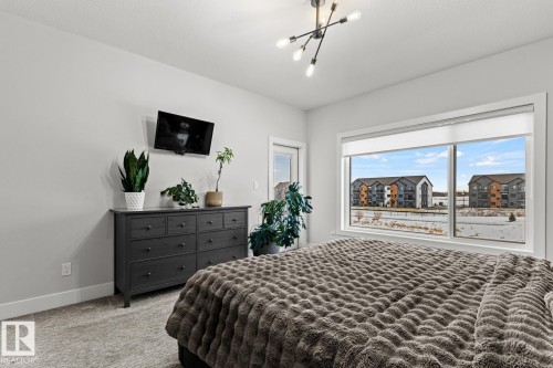 Bedroom with carpet floors and baseboards - 5 Starling, Fort Saskatchewan, AB 
