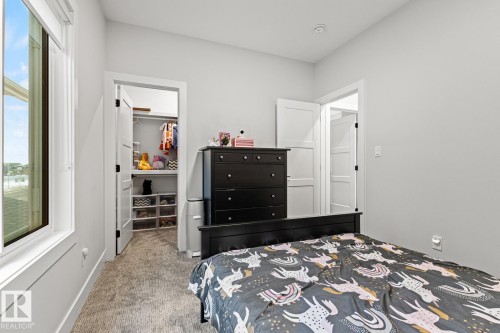 Bedroom with a walk in closet - 5 Starling, Fort Saskatchewan, AB 