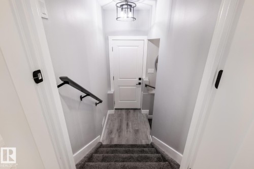 Stairs to basement with side door entrance - 5 Starling, Fort Saskatchewan, AB 