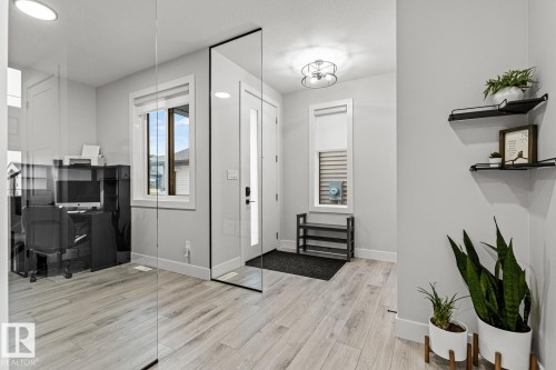 Entryway with office with 10 mil glass walls - 5 Starling, Fort Saskatchewan, AB 