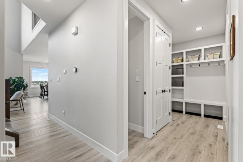 Hallway with mud room and entrance to main floor powder room. - 5 Starling, Fort Saskatchewan, AB 