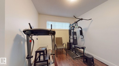 5440 1A Avenue, Edmonton, AB - Indoor Photo Showing Gym Room