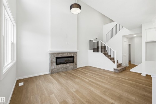 5107 69 Street, Beaumont, AB - Indoor With Fireplace