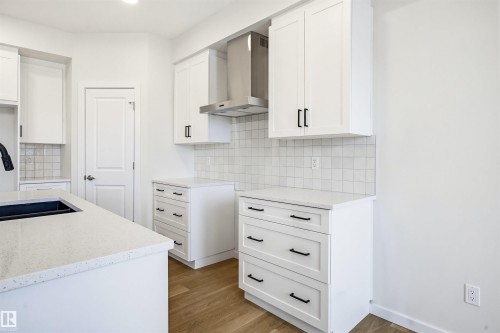 5107 69 Street, Beaumont, AB - Indoor Photo Showing Kitchen With Double Sink