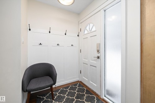 Doorway featuring wood finished floors - 12 Beacon Crescent, St. Albert, AB - Indoor Photo Showing Other Room