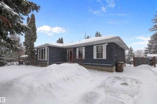 View of front facade with a gate - 12 Beacon Crescent, St. Albert, AB - Outdoor