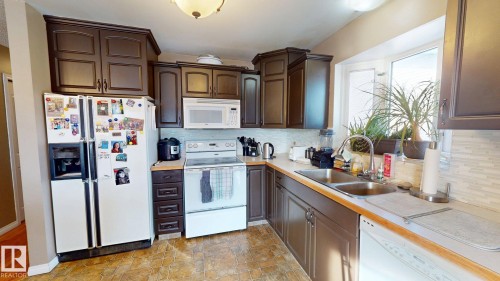 4329 45 Avenue, Drayton Valley, AB - Indoor Photo Showing Kitchen With Double Sink